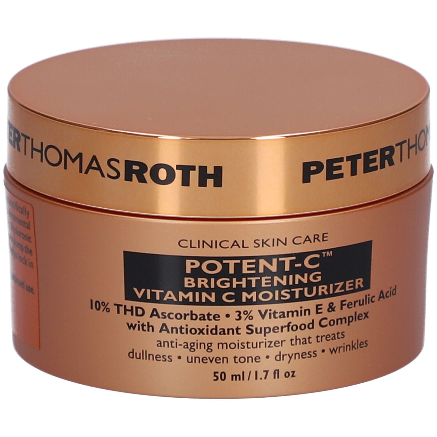 Pot brun avec couvercle doré. Inscription : POTENT-C, Vitamin C Moisturizer. 50 ml/1.7 fl oz.