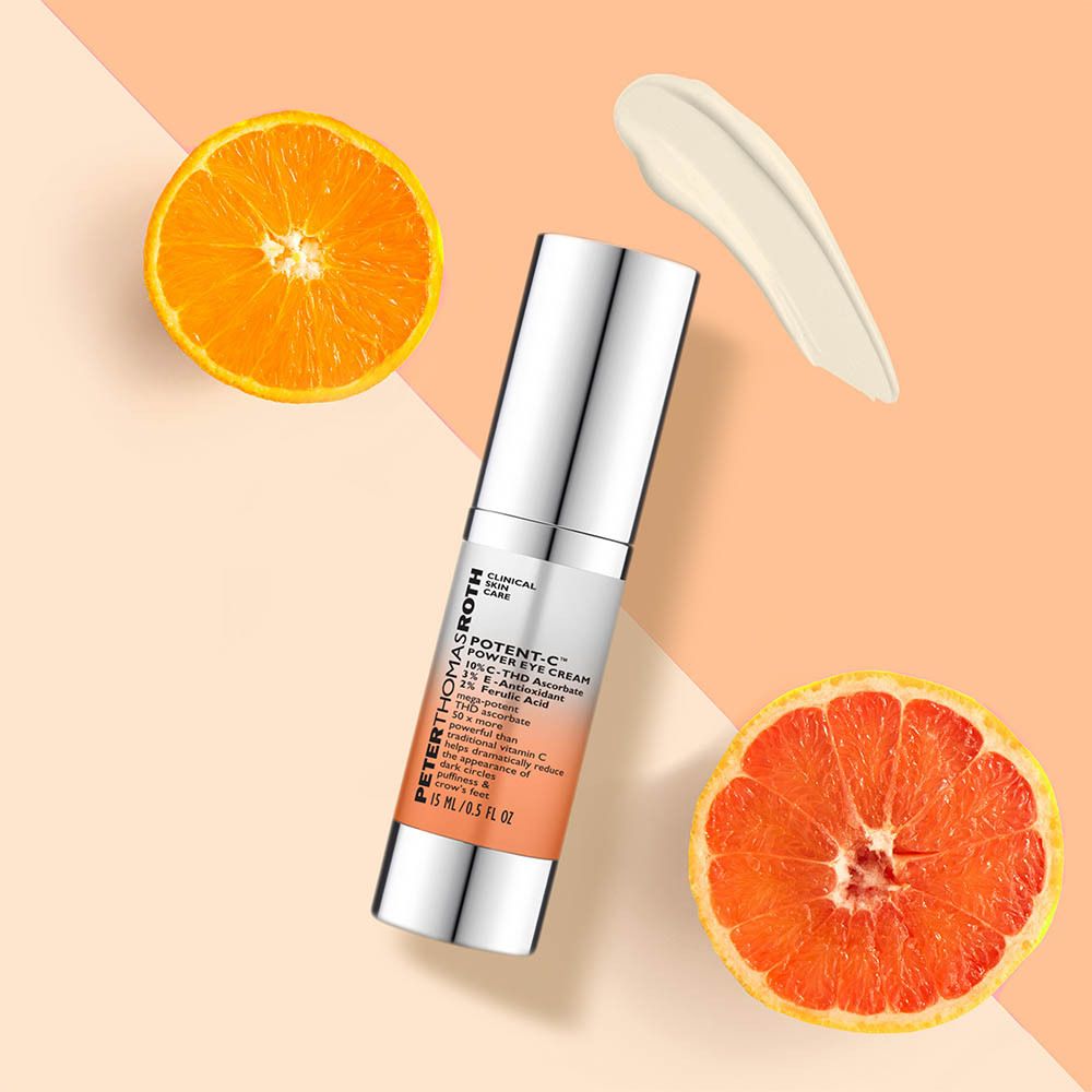 Tube de crème pour les yeux argenté avec texte blanc. Inscription : Potent-C Power Eye Cream, 15 ml/0,5 fl oz.