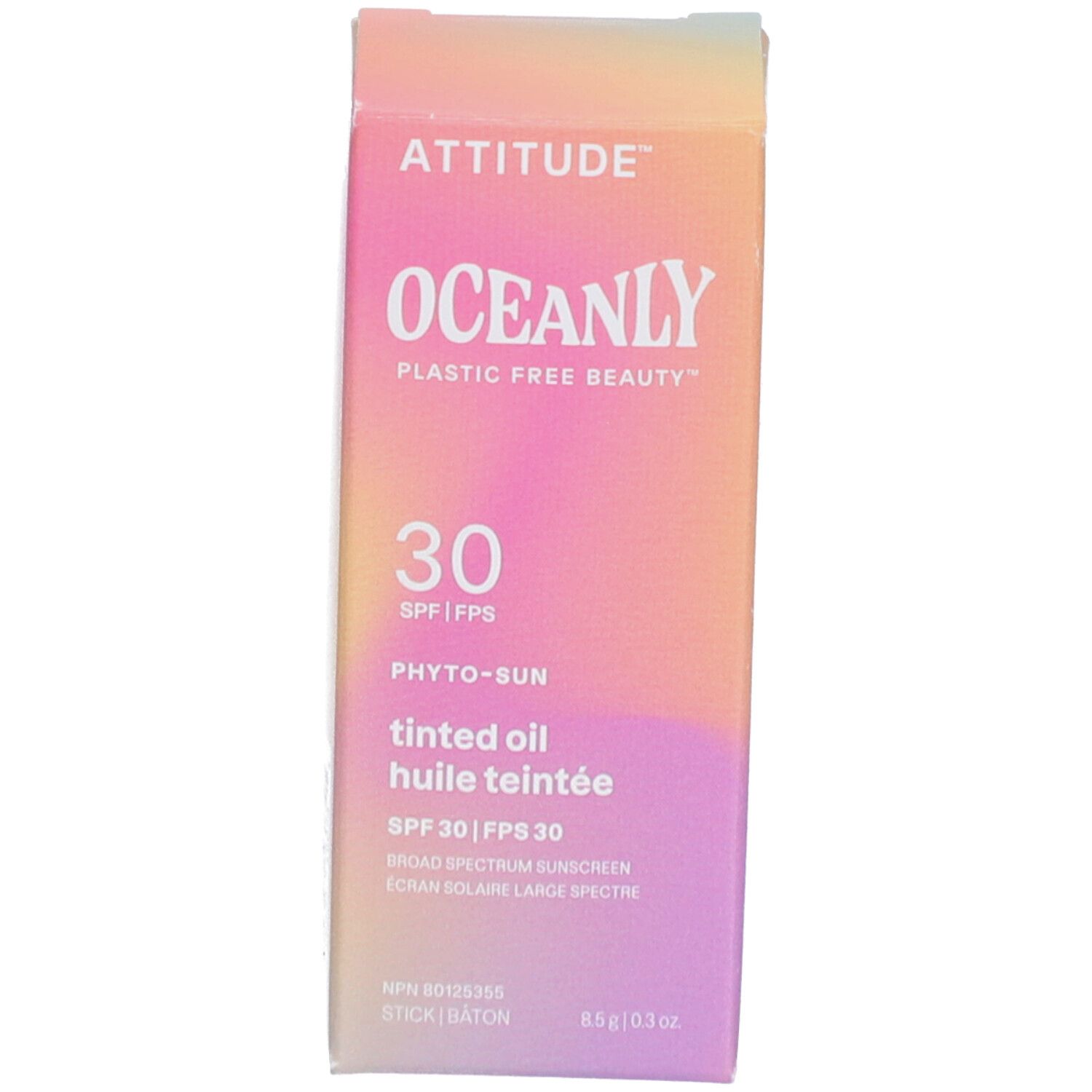Emballage de crème solaire. Inscriptions : ATTITUDE, OCEANLY, SPF 30. Dégradé de couleurs orange et rose.