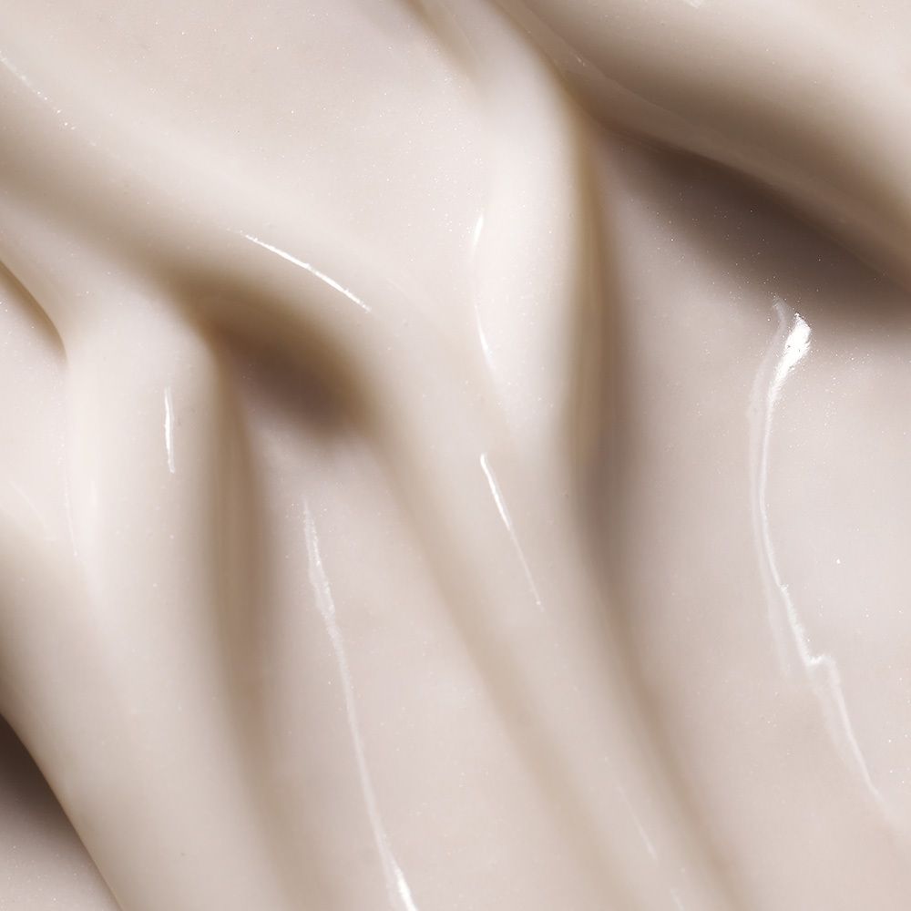 Texture de crème, beige clair, brillante.