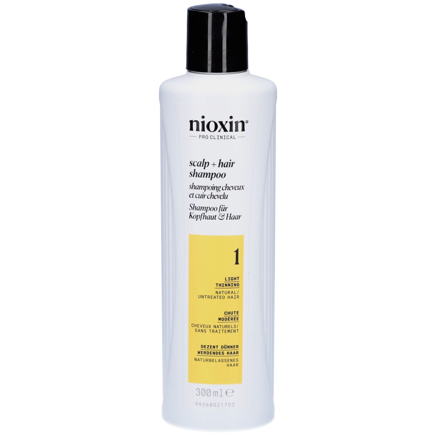 Flacon blanc, bouchon noir. Inscriptions: Nioxin, Scalp & Hair Shampoo, 1. Zone jaune avec texte. 300ml.