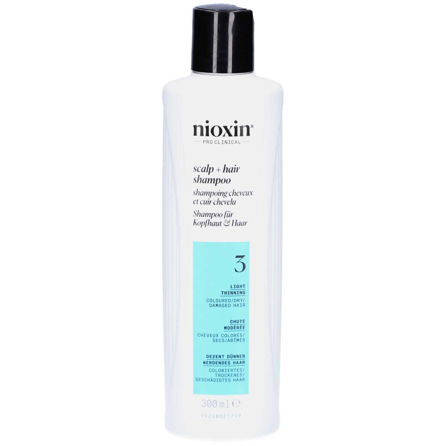 Flacon blanc, bouchon noir. Inscription: Nioxin, Scalp + Hair Shampoo, 3. Pour cheveux colorés et clairsemés.