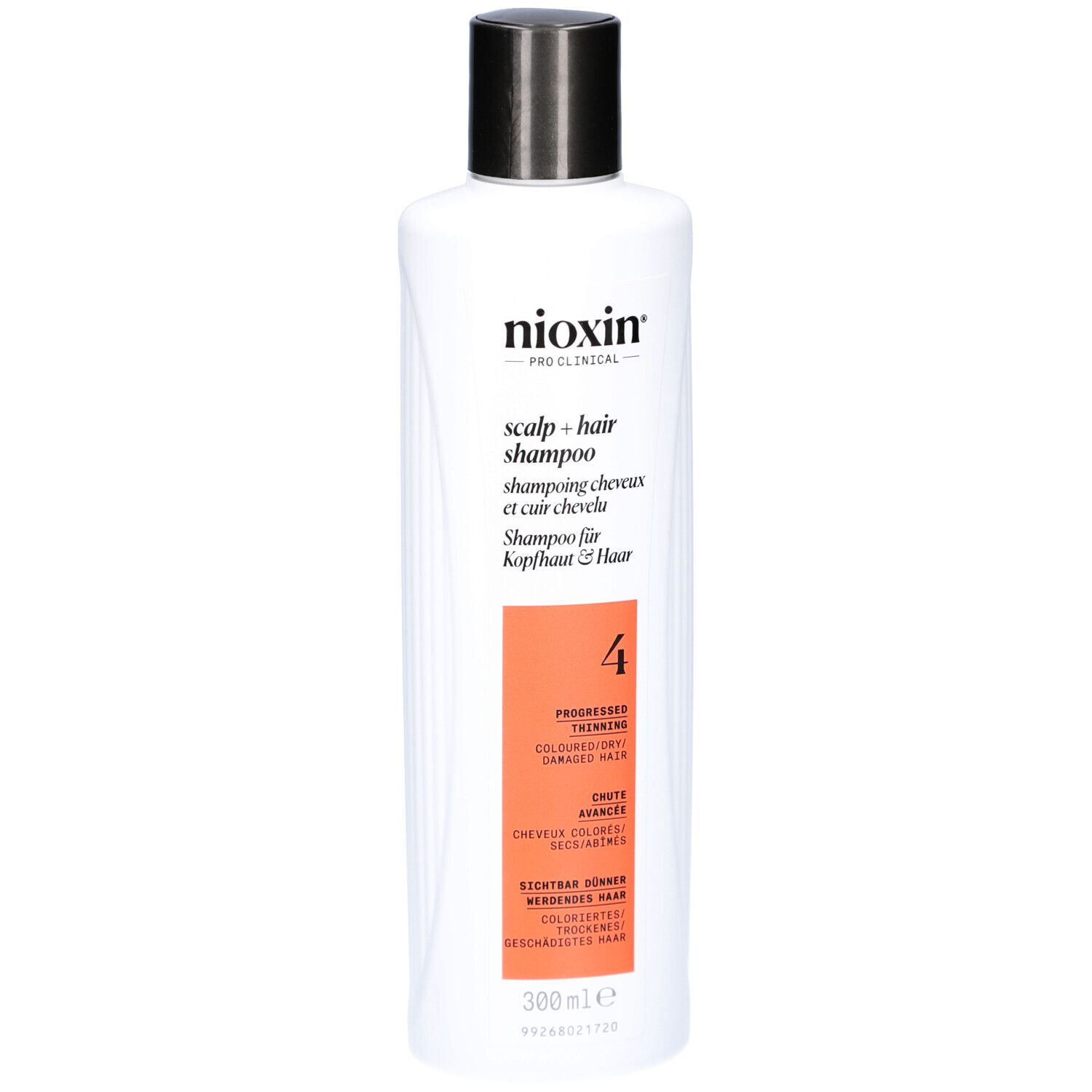 Shampoo blanc avec bouchon noir. Inscription : Nioxin, Scalp + Hair Shampoo, 4. Pour cheveux colorés et clairsemés.