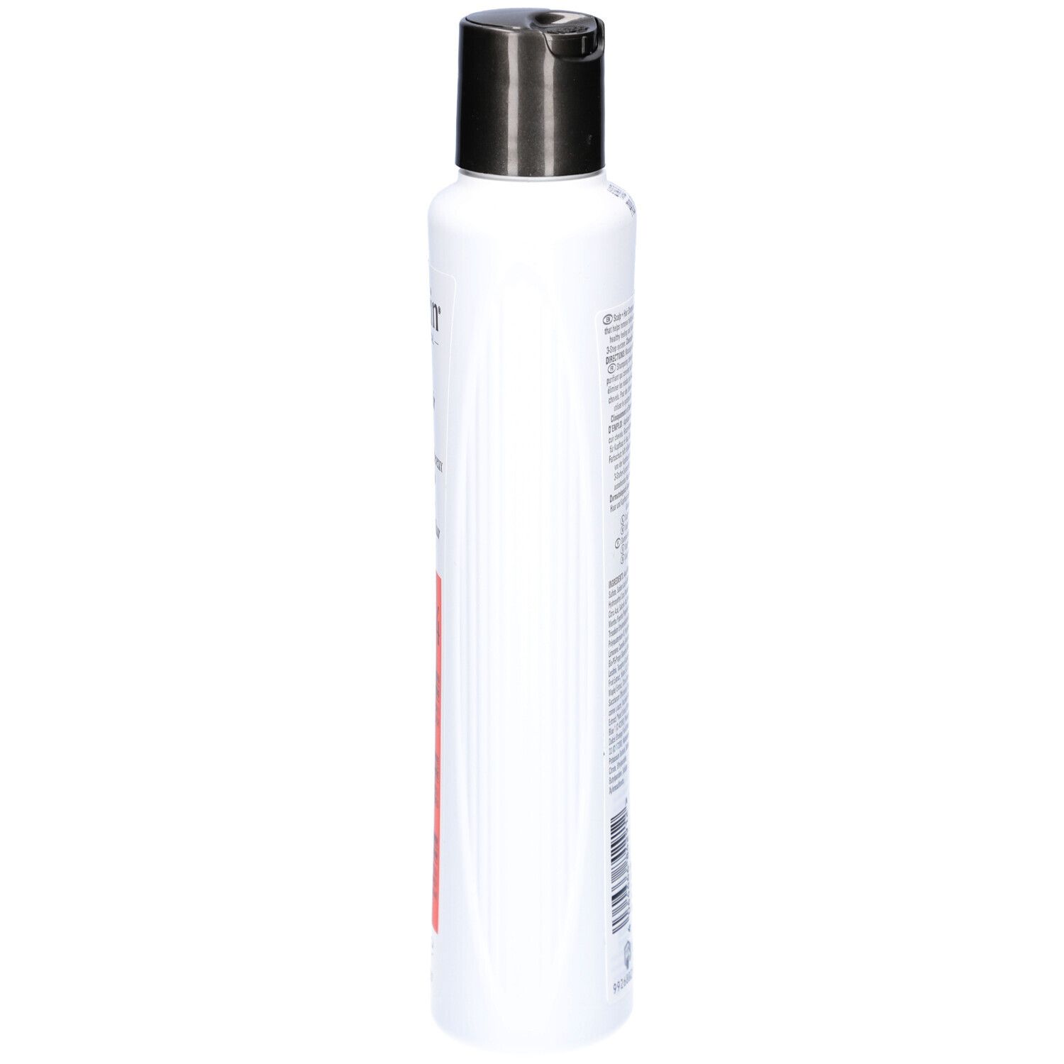 Shampoo blanc avec bouchon noir, vue latérale. Inscription : Nioxin. Bande orange avec texte.