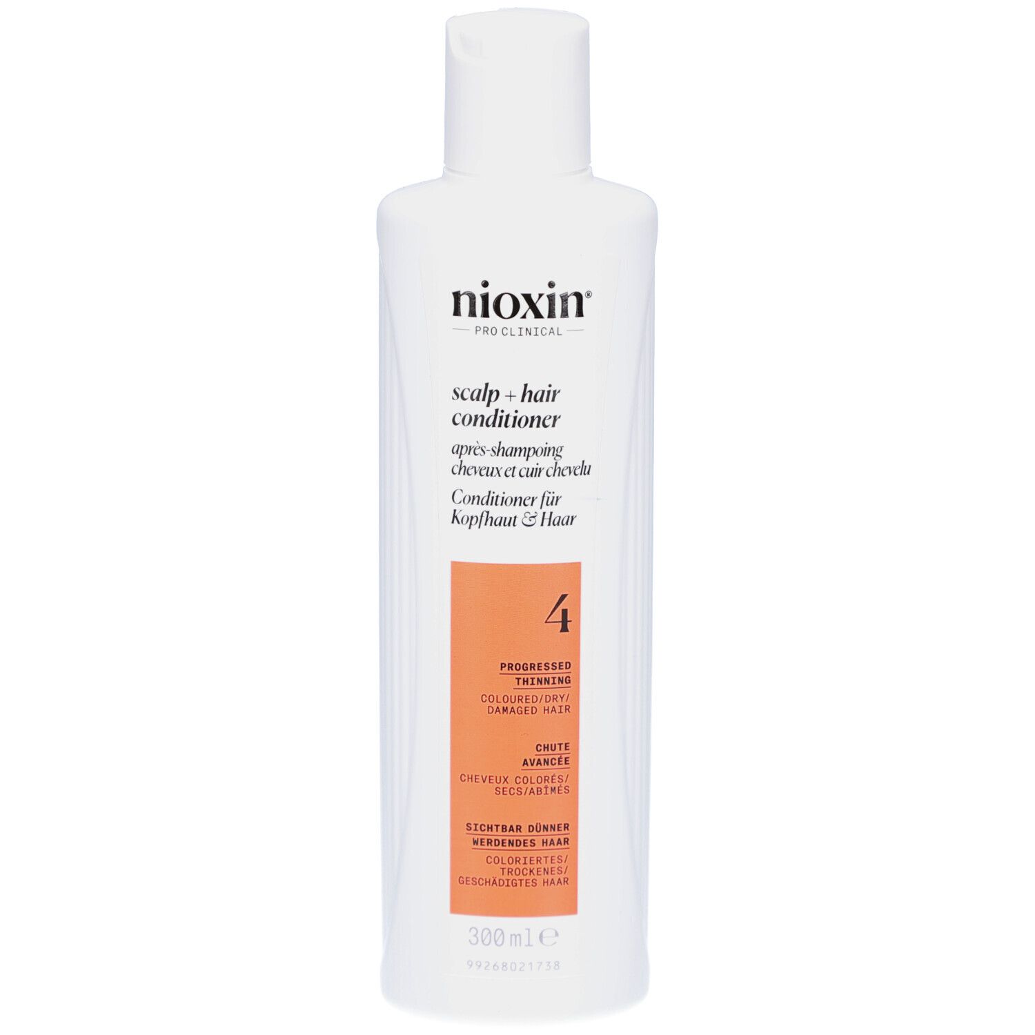 Flacon blanc de revitalisant Nioxin. Étiquette orange avec texte. 300 ml. Pour cheveux colorés et clairsemés.