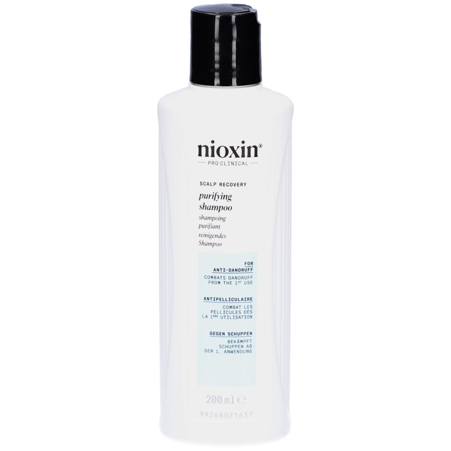 Flacon blanc, bouchon noir. Inscription: Nioxin, Scalp Recovery, purifying shampoo. Texte: For anti-dandruff. Contre les pellicules.