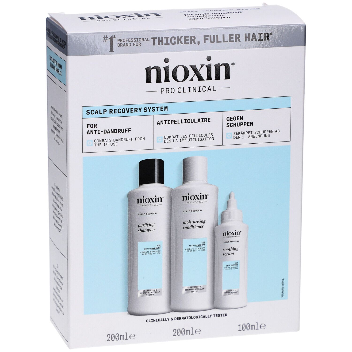 Kit Nioxin Scalp Recovery. Boîte avec trois produits : shampooing, revitalisant et sérum. Design blanc et bleu. Texte : Anti-pelliculaire.
