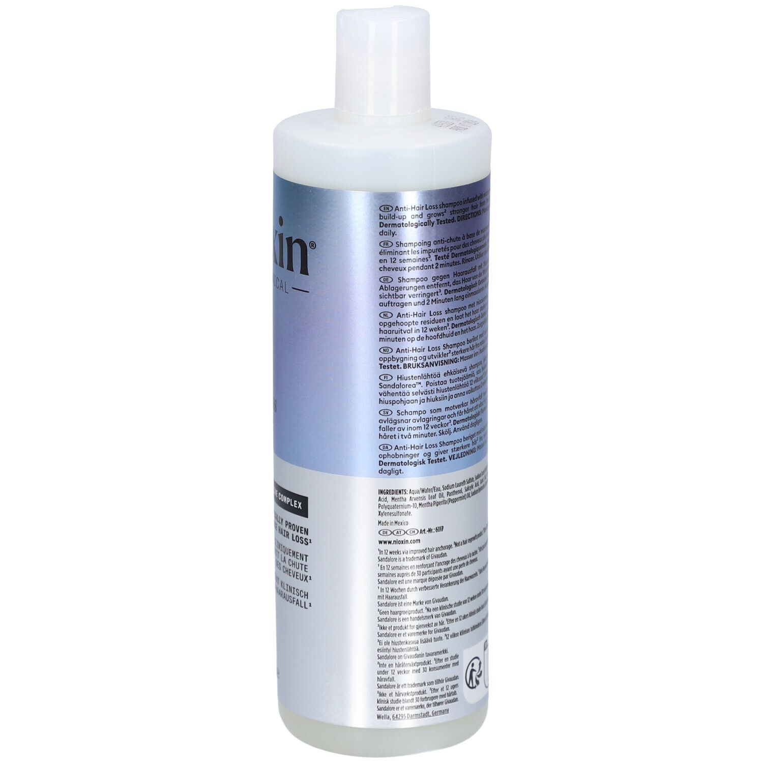 Dos de la bouteille de shampooing Nioxin. Contient du texte en plusieurs langues, y compris des informations d'utilisation.