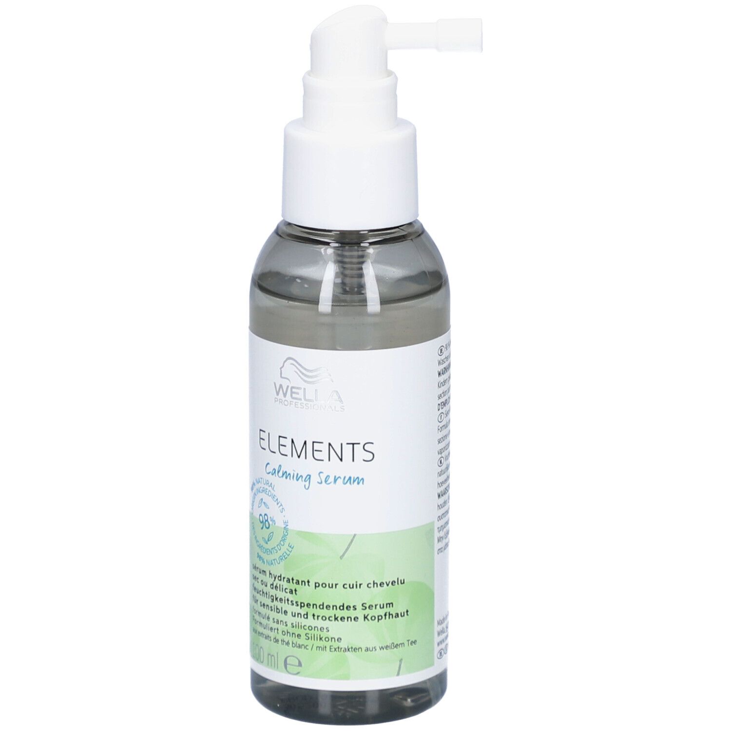Flacon transparent avec pompe blanche. Inscription: ELEMENTS Calming Serum. Étiquette verte et blanche avec texte.