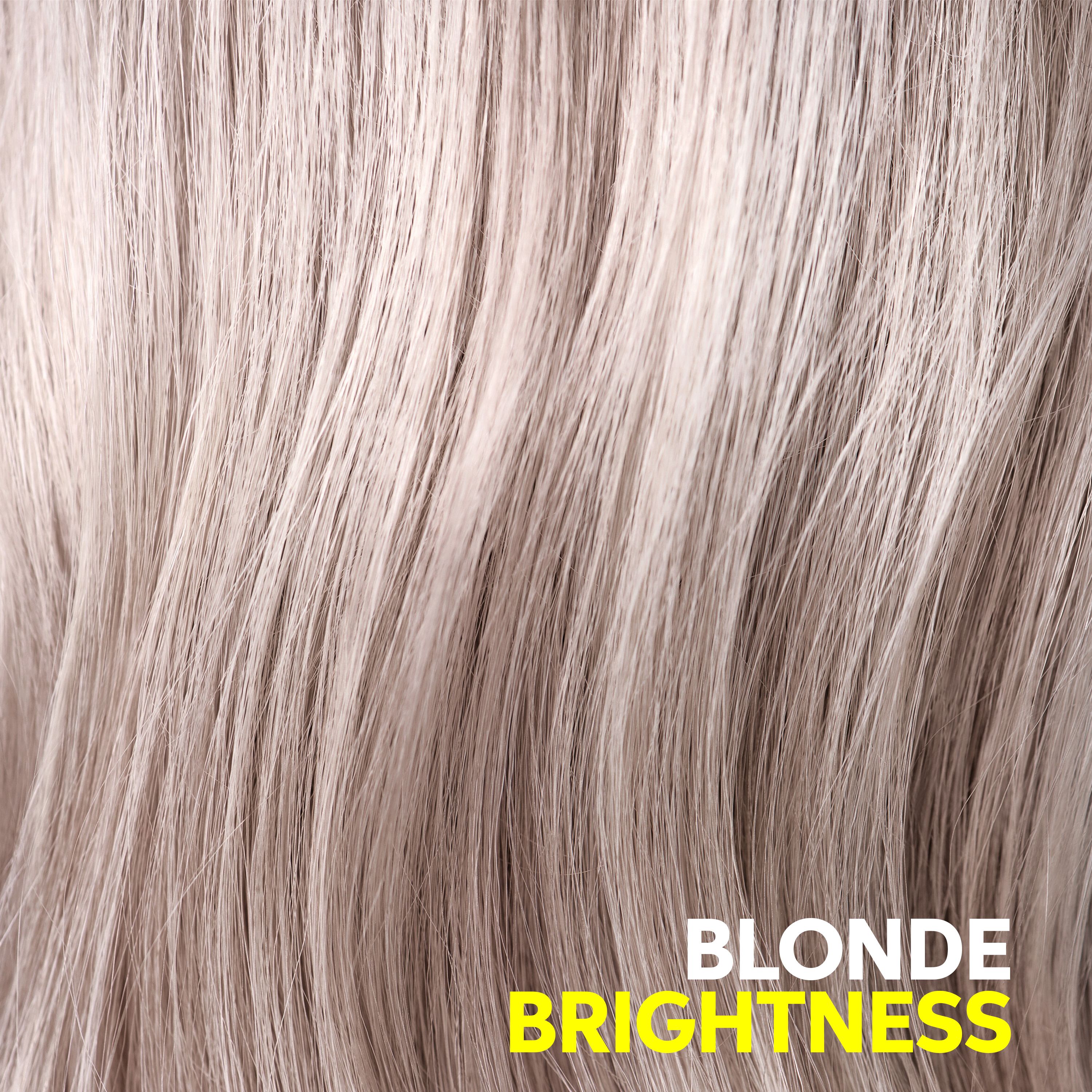 Gros plan sur des cheveux blonds. Texte: Blonde Brightness.
