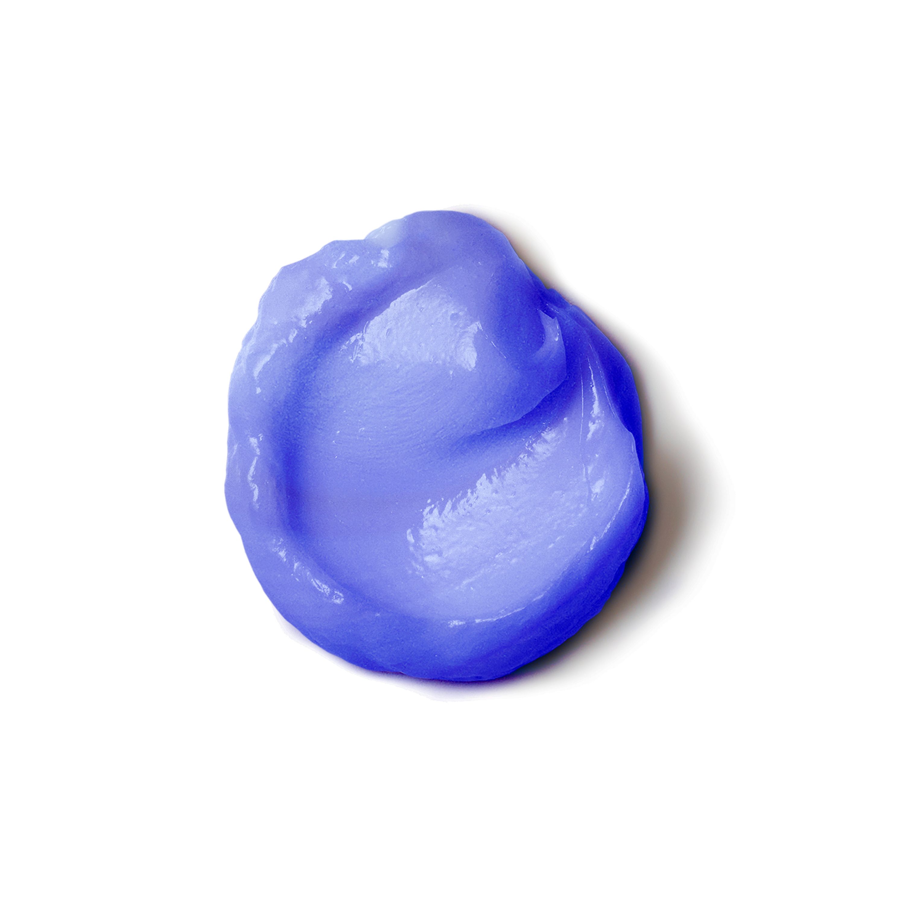Éclaboussure de revitalisant violet. Sur fond blanc.