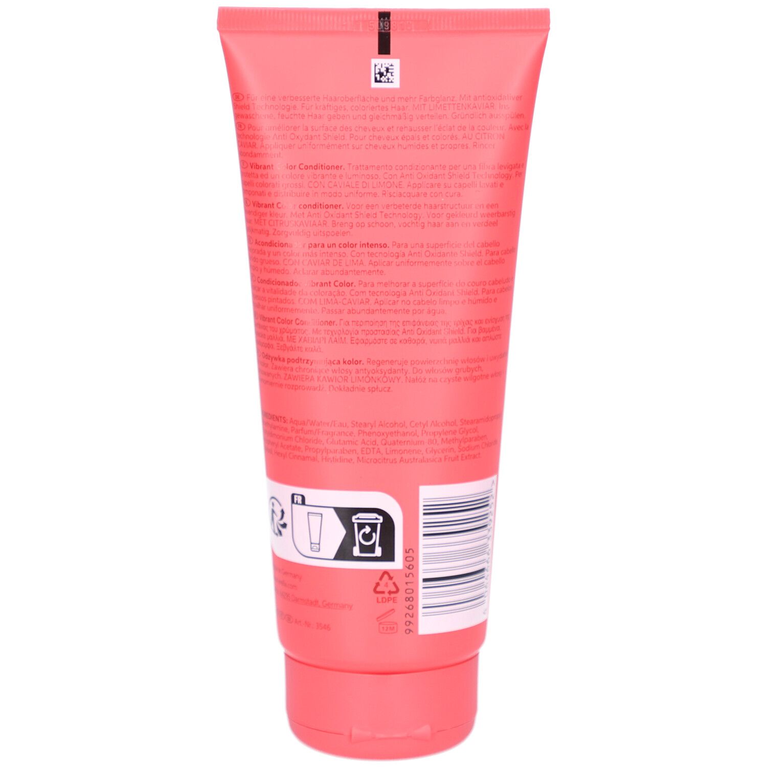 Dos d'un tube rose. Texte multilingue. Informations sur le produit. Symbole de recyclage. Code-barres.