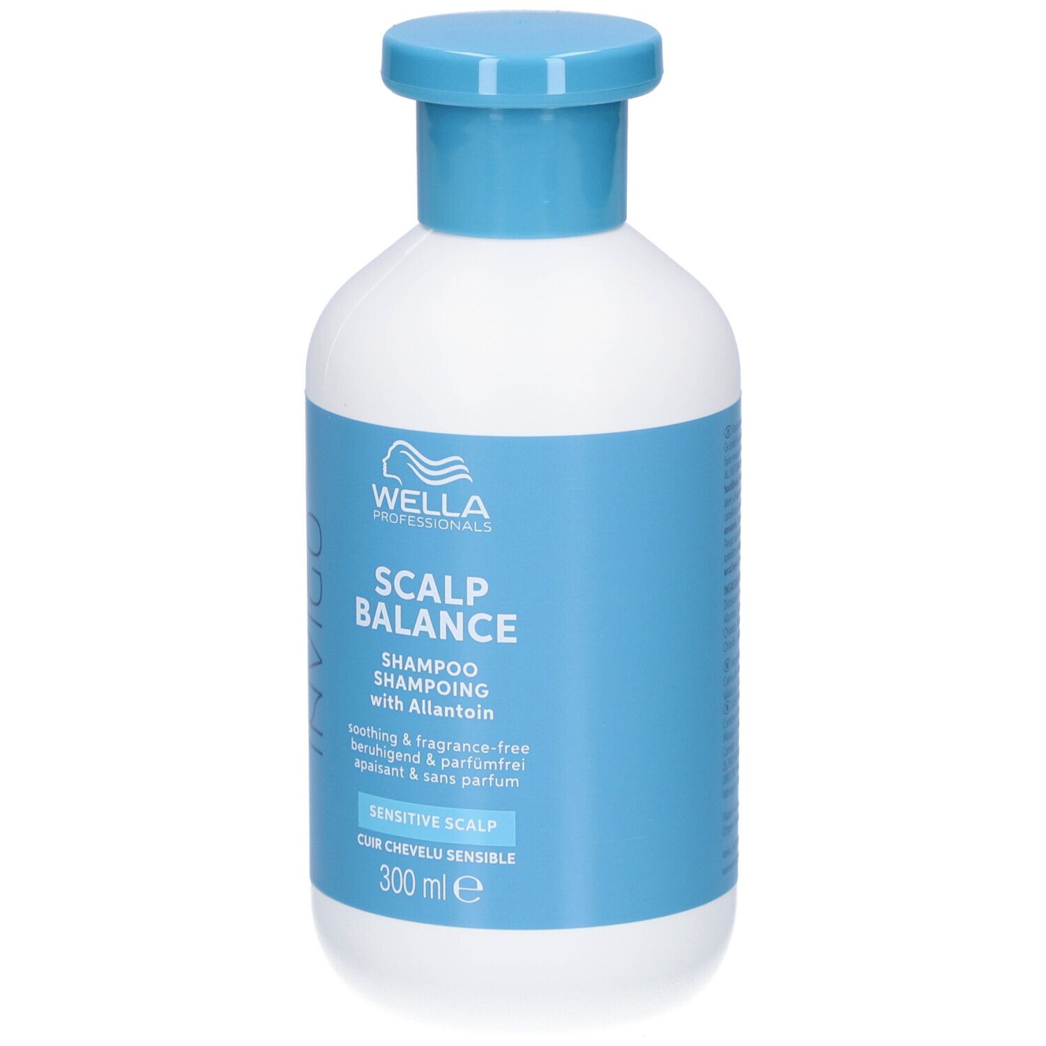 Flacon blanc, bouchon bleu. Inscriptions: INVIGO, SCALP BALANCE, Shampooing, Cuir chevelu sensible. 300 ml.