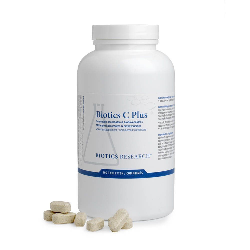 Un flacon blanc de Biotics C Plus 1000 mg et plusieurs comprimés à côté. Contient 300 comprimés.