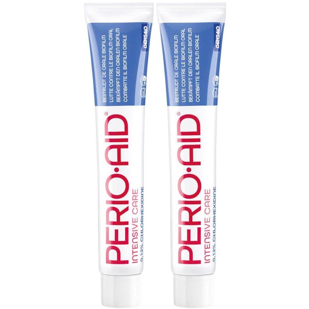 Deux tubes de gel Perio-Aid Intensive Care. Blanc, avec texte rouge et bleu. Contient de la chlorhexidine.