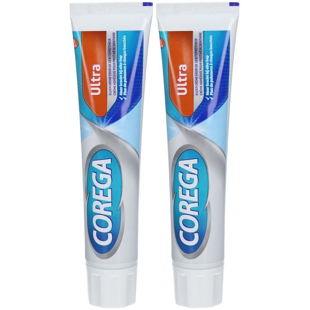 Deux tubes de Corega Ultra Fresh Crème Adhesive. Emballage bleu, blanc et orange. Texte: Corega, Ultra.