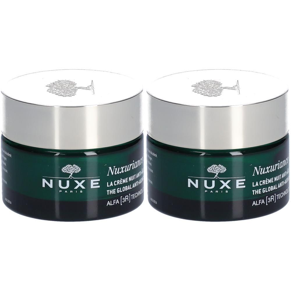 Deux pots de NUXE Nuxuriance Ultra Crème Nuit Anti-Âge Global. Pots verts, couvercles argentés. Logo et texte.