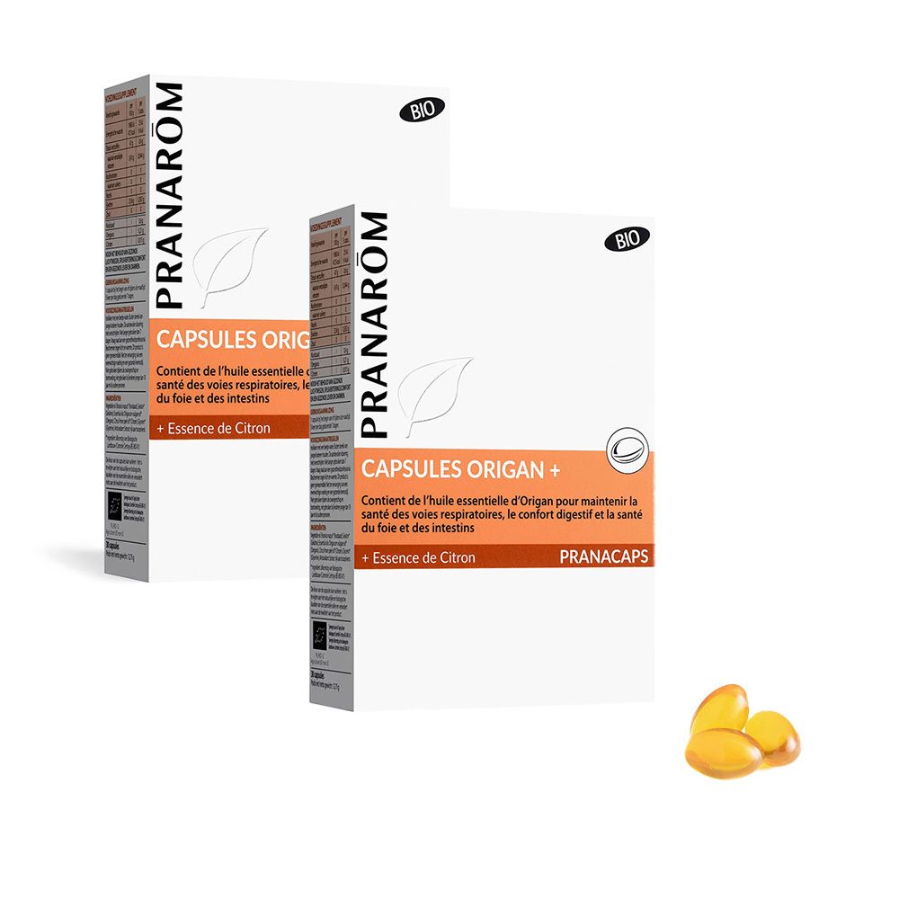 Deux boîtes "PRANAROM CAPSULES ORIGAN+" avec logo BIO. Capsules jaunes visibles à côté des boîtes.