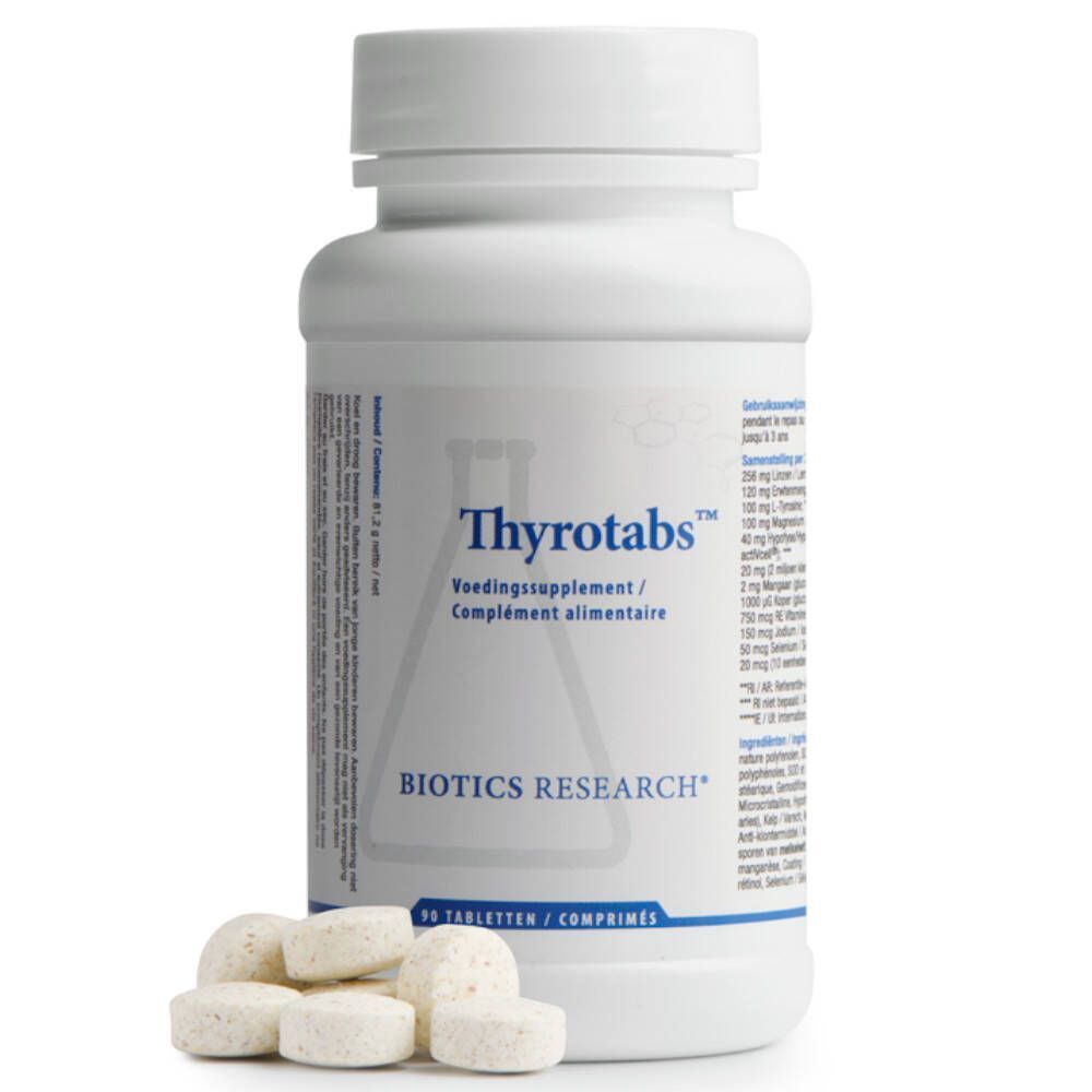 Flacon blanc Thyrotabs™ avec comprimés à côté. Inscription: BIOTICS RESEARCH®. Étiquette avec informations produit.
