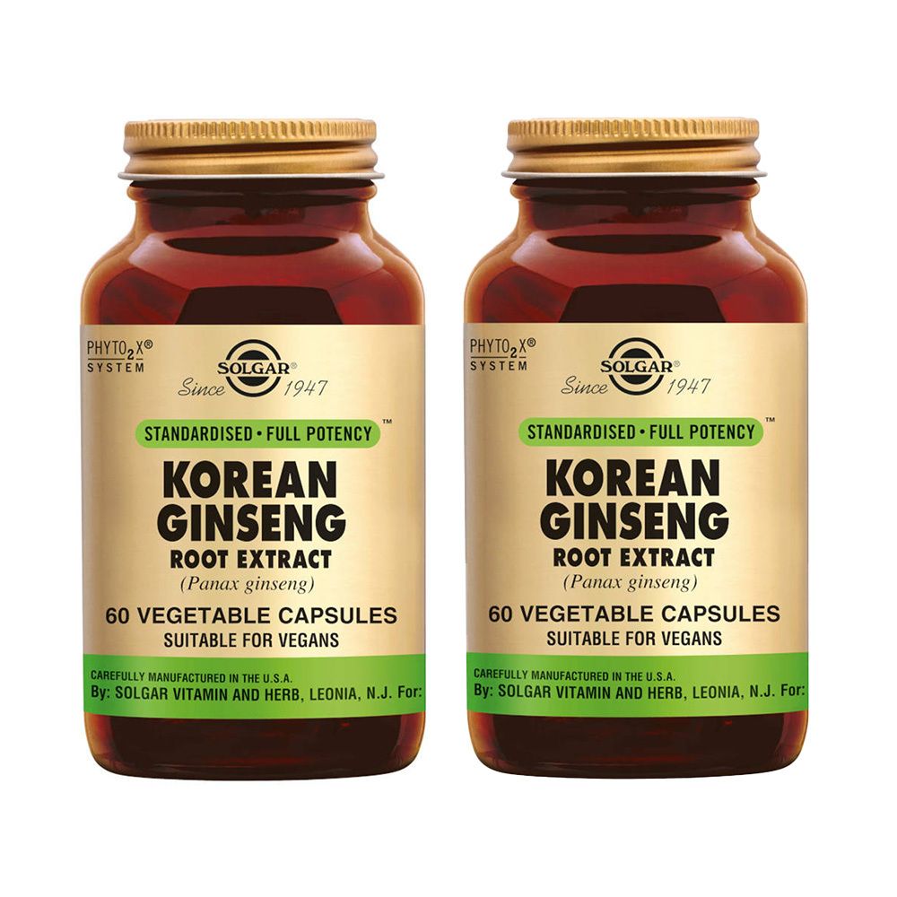 Deux flacons de Solgar Korean Ginseng Root Extract. Flacons en verre brun avec bouchons dorés et étiquettes avec informations.