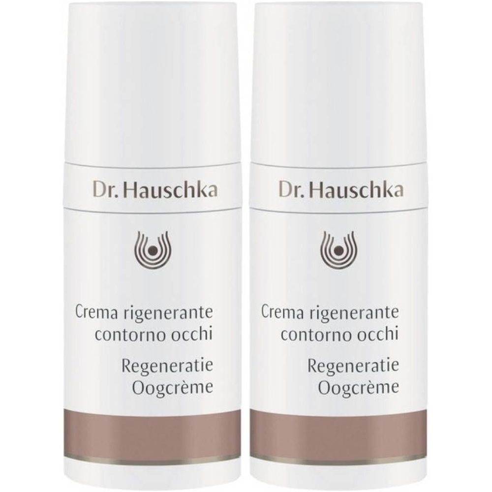 Deux flacons blancs avec bande marron. Inscription: Dr. Hauschka, Creme regenerante contorno occhi, Regeneration Oogcrème.