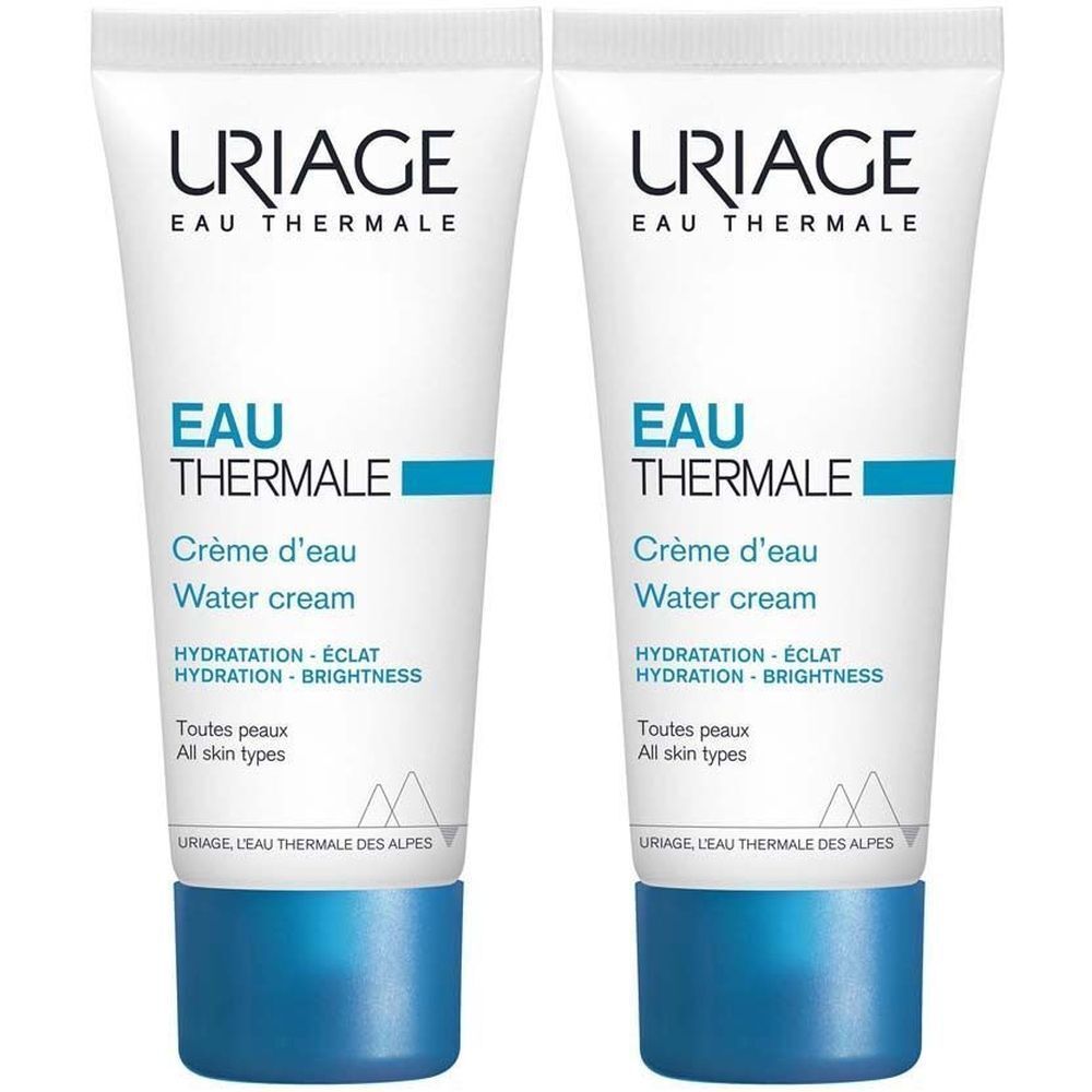Deux tubes de crème d'eau Uriage Eau Thermale. Tubes blancs avec texte et bande bleus. Texte: Eau Thermale, Water cream.