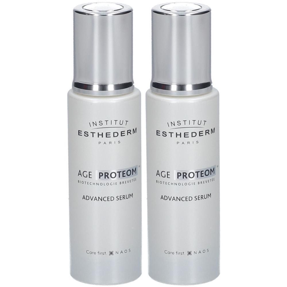 Deux flacons de sérum avec bouchons argentés. Inscription: Institut Esthederm, Age Proteom Advanced Serum.