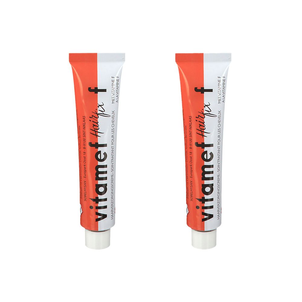 Deux tubes de Vitamef Hairfix. Tubes blancs avec tête orange et texte. Logos et texte rouges.