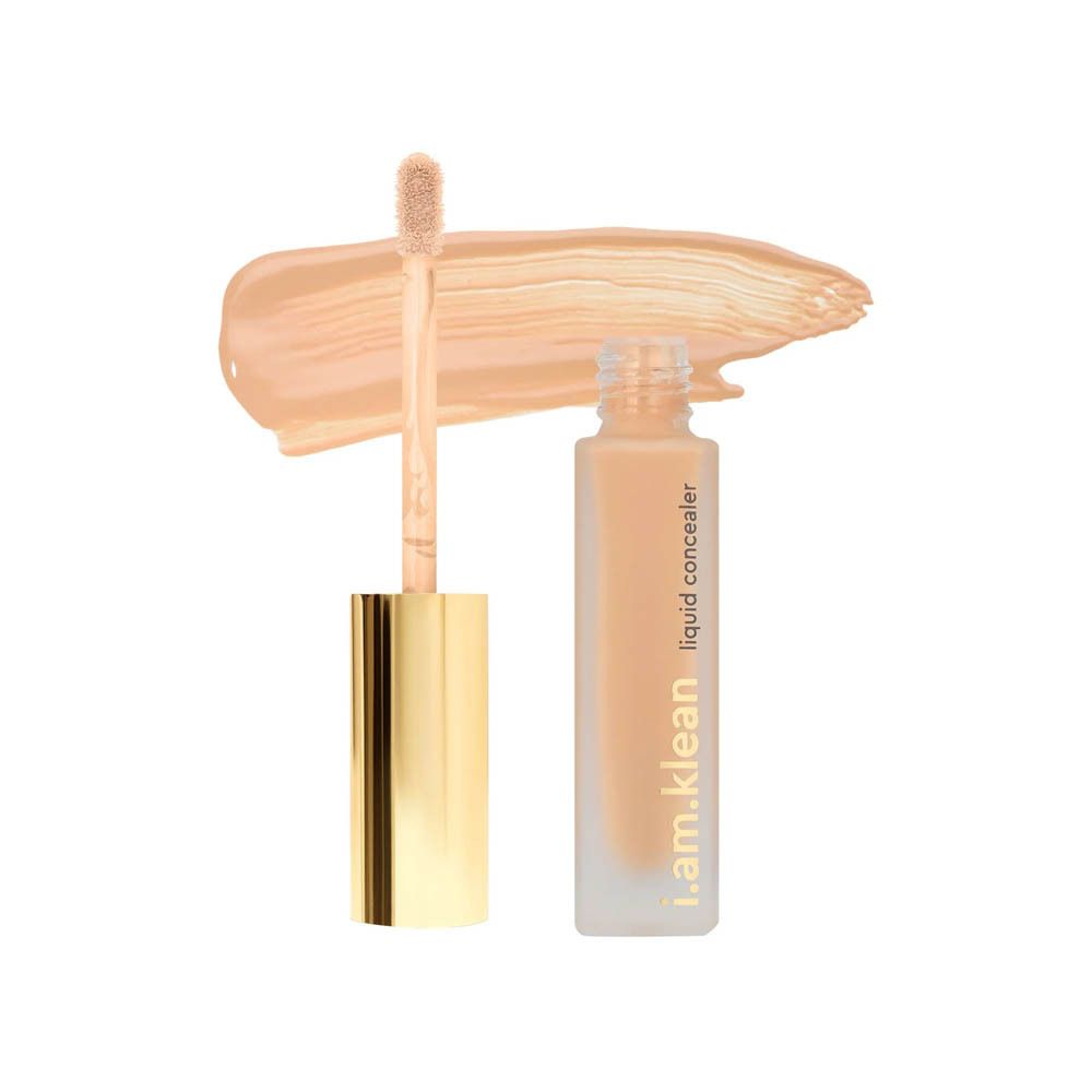 Correcteur liquide avec applicateur et échantillon de couleur. Le flacon porte la mention .am.klean et liquid concealer.