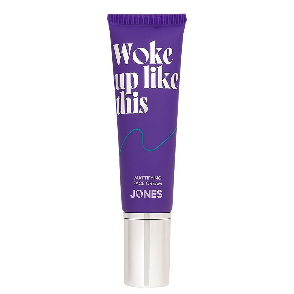 Tube violet avec bouchon argenté. Inscription : Woke up like this. Mattifying Face Cream. Marque : JONES.