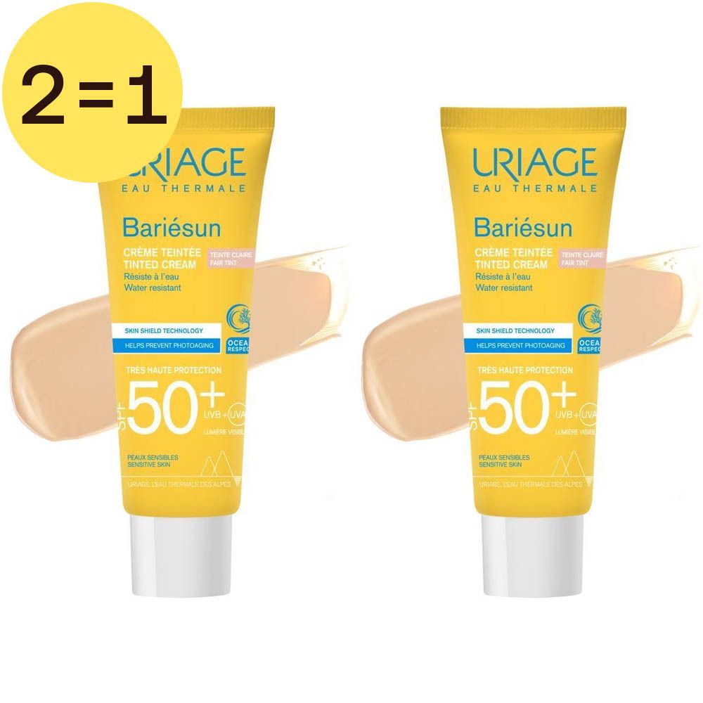 Deux tubes jaunes de crème Uriage Bariésun SPF 50+. Inscription : Crème Teintée. Label 2=1.