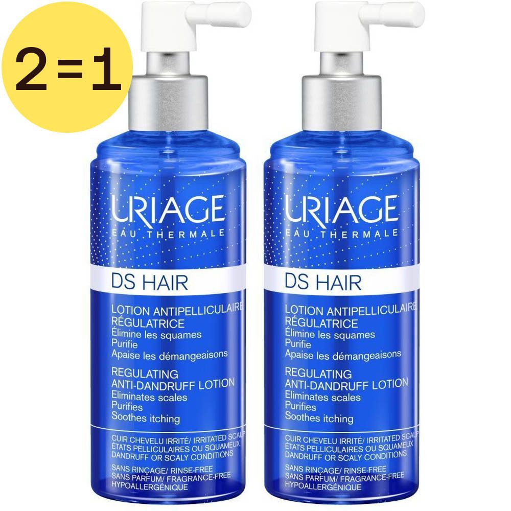 Deux flacons de lotion Uriage DS Hair. Flacons bleus avec vaporisateur blanc. Inscription : Lotion antipelliculaire. Étiquette jaune : 2=1.