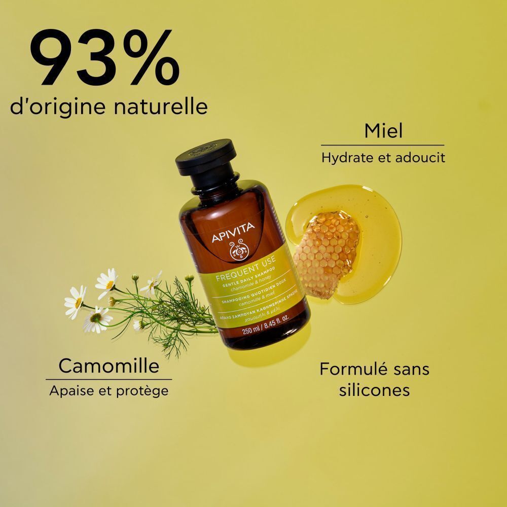 Flacon de shampooing avec camomille, miel et texte : 93% d'origine naturelle, Miel, Camomille, Formulé sans silicones.