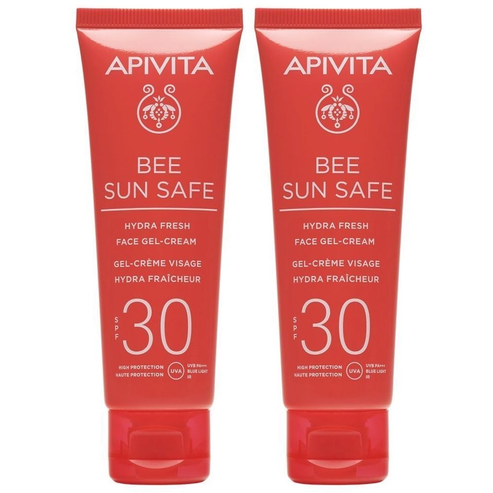 Deux tubes de gel-crème Apivita Bee Sun Safe. Tubes rouges avec texte blanc. SPF 30. Logo et nom du produit.