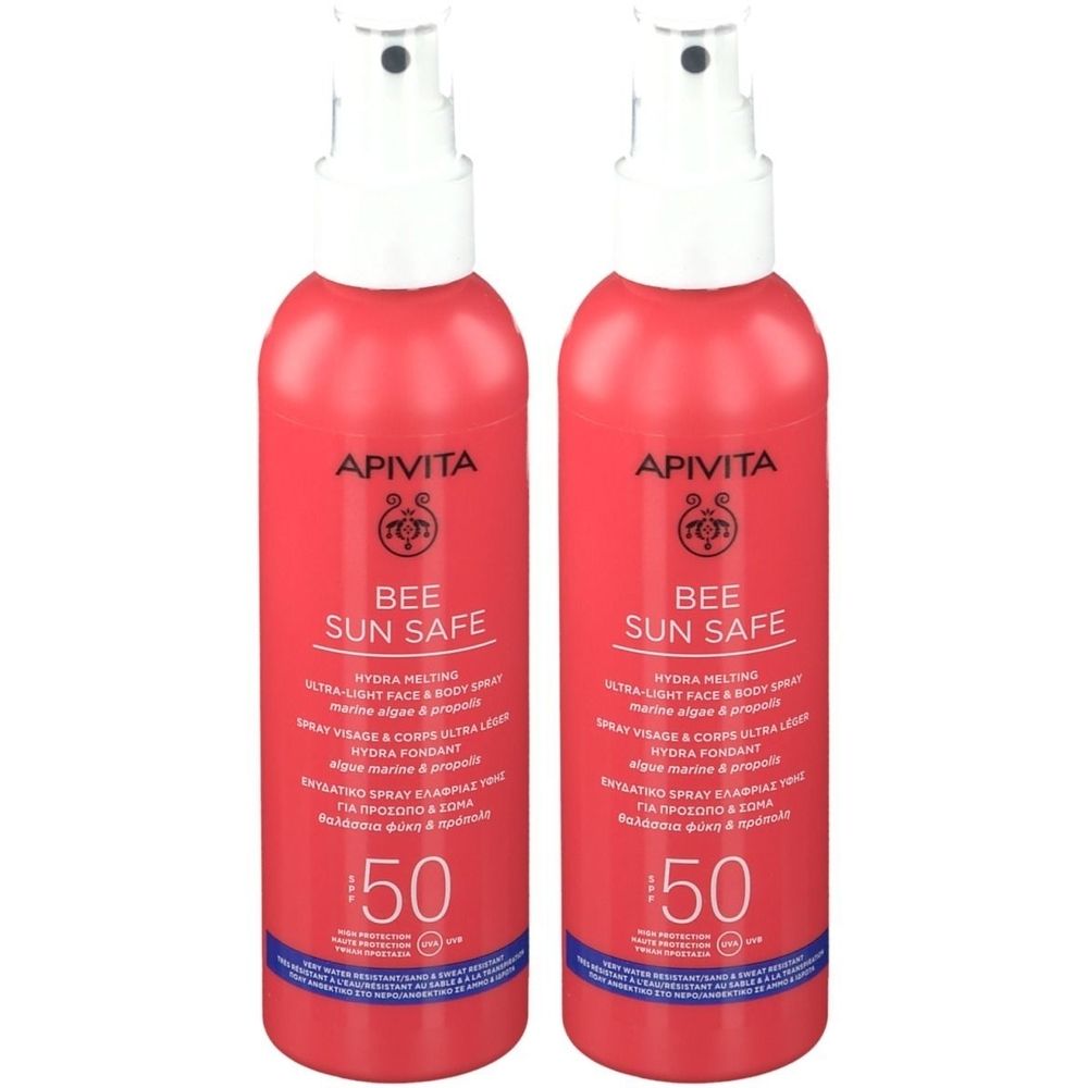 Deux sprays rouges avec vaporisateur blanc. Inscription: Apivita Bee Sun Safe, SPF 50. Texte multilingue.