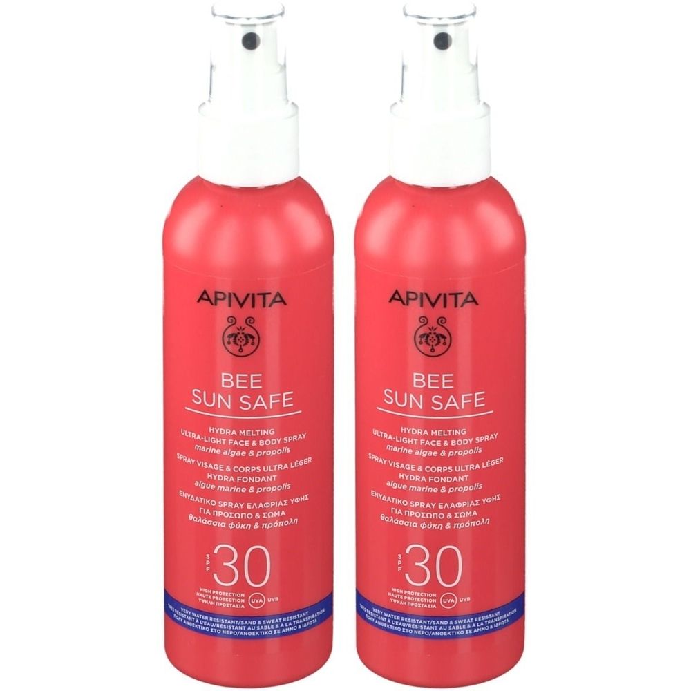 Deux flacons rouges avec vaporisateur blanc. Inscription: Apivita Bee Sun Safe, SPF30. Algues marines & propolis.