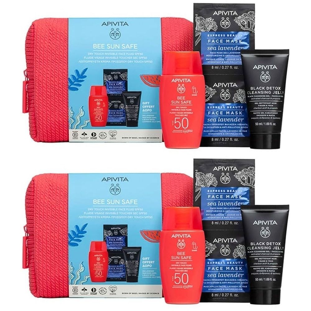 Trousse de toilette rouge avec crème solaire, masques visage et autres produits. Contient un flacon de crème solaire SPF 50.