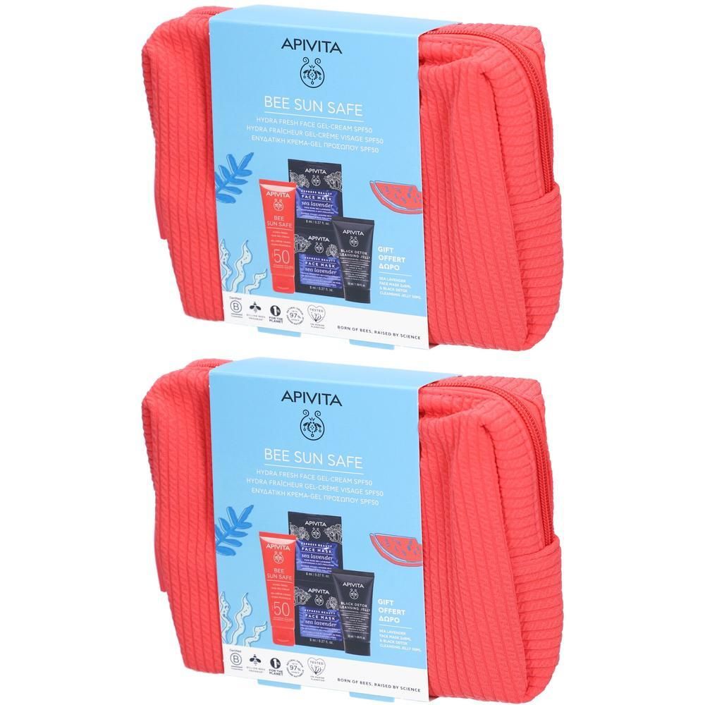 Ensemble de produits solaires dans une trousse rouge. Emballage bleu avec nom et logo de la marque.