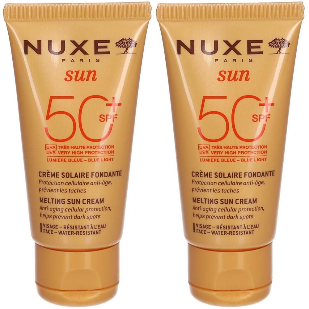 Deux tubes de Nuxe Sun Crème Solaire Fondante SPF50+. Tubes dorés avec texte brun. Contient SPF50+ et des informations.