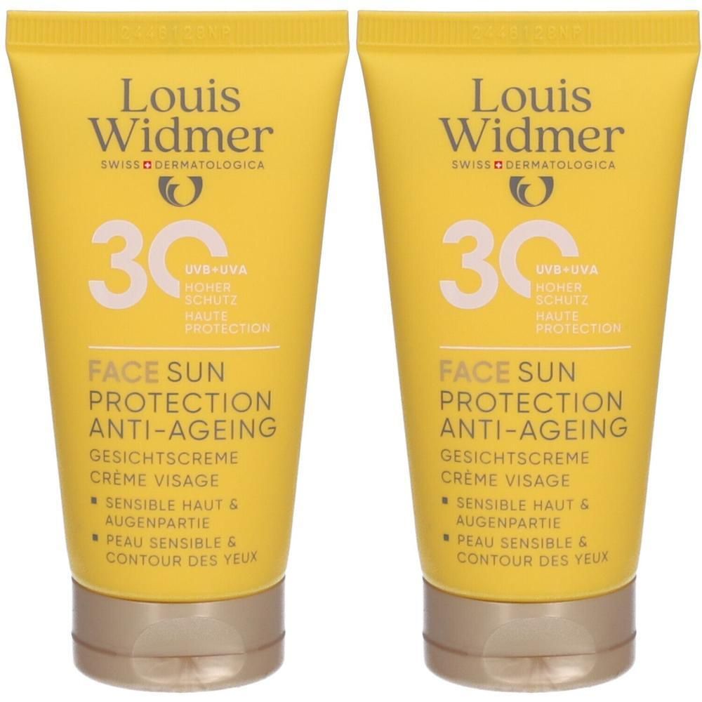 Deux tubes jaunes de protection solaire Louis Widmer. Inscription : Face Sun Protection Anti-Ageing, SPF 30. Pour peaux sensibles et yeux.