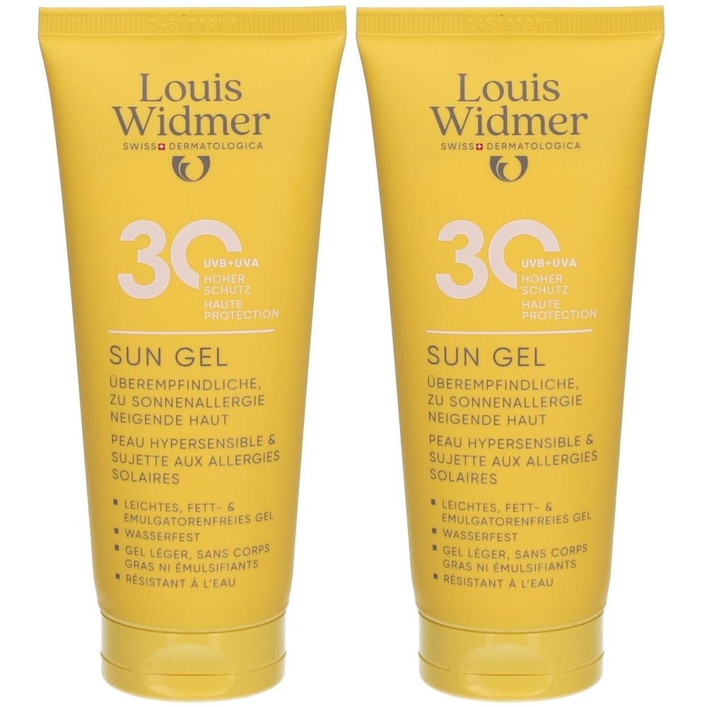Deux tubes de gel solaire jaune. Inscription: Louis Widmer Sun Gel 30. Texte en allemand et français.
