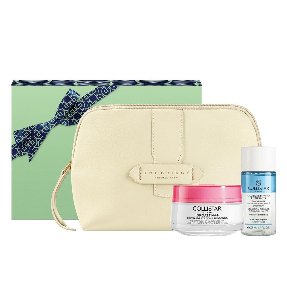 Coffret cadeau avec trousse, crème et solution nettoyante. Trousse crème, logo. Crème avec couvercle rose. Marque Collistar.