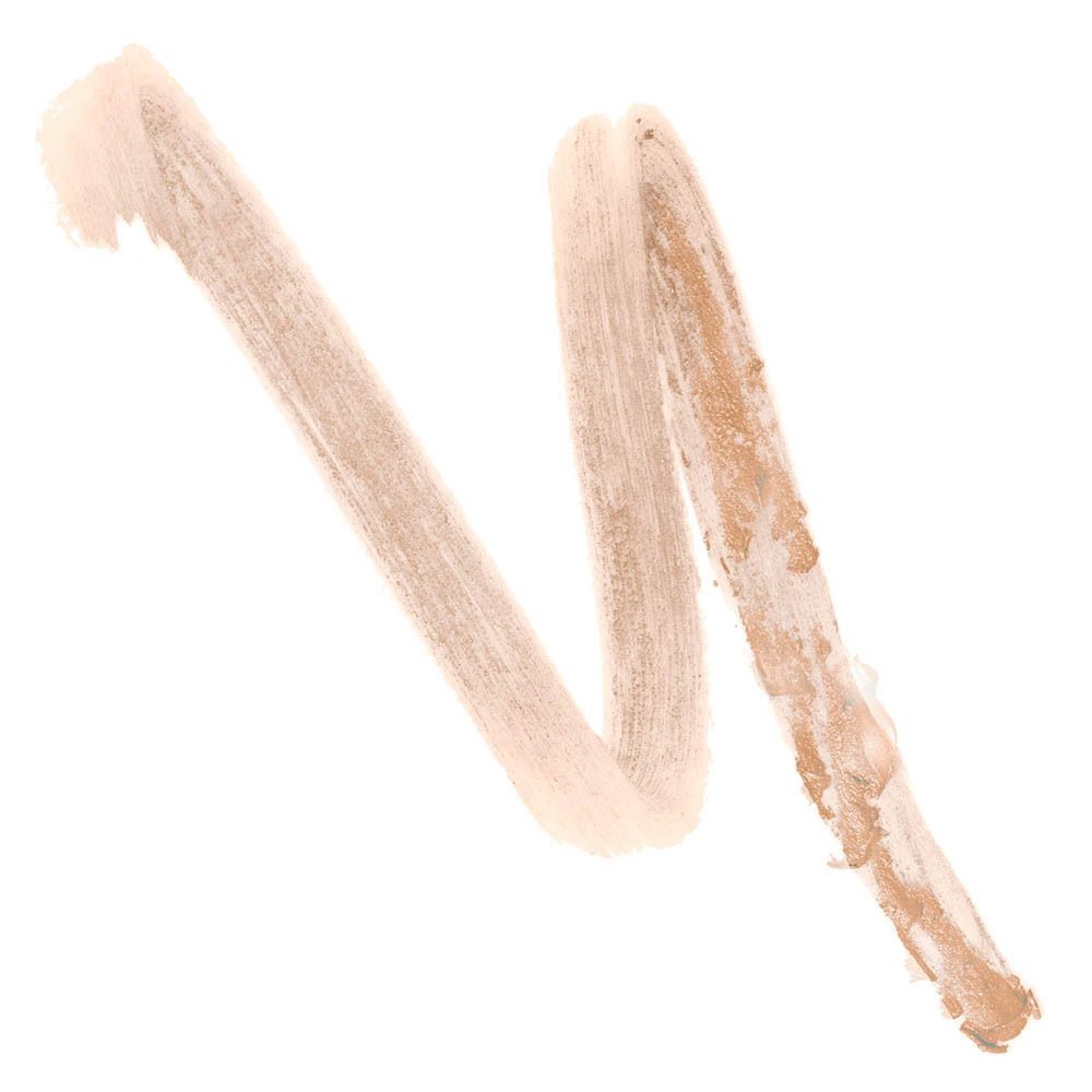 Trait beige laissé par un crayon fard à paupières. Sur fond blanc.