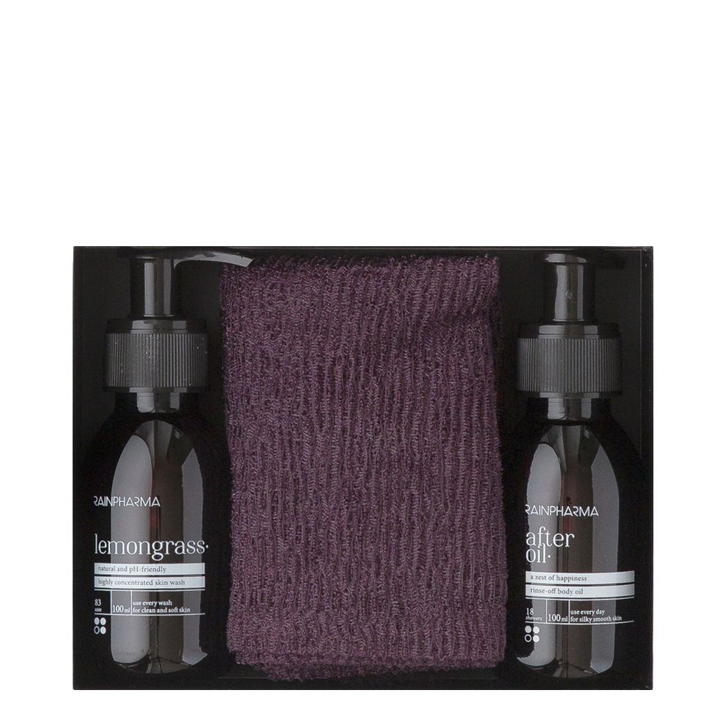 Ensemble Rainpharma Bathroom Treasures. Contient deux flacons et un gant de toilette violet. Fond noir.