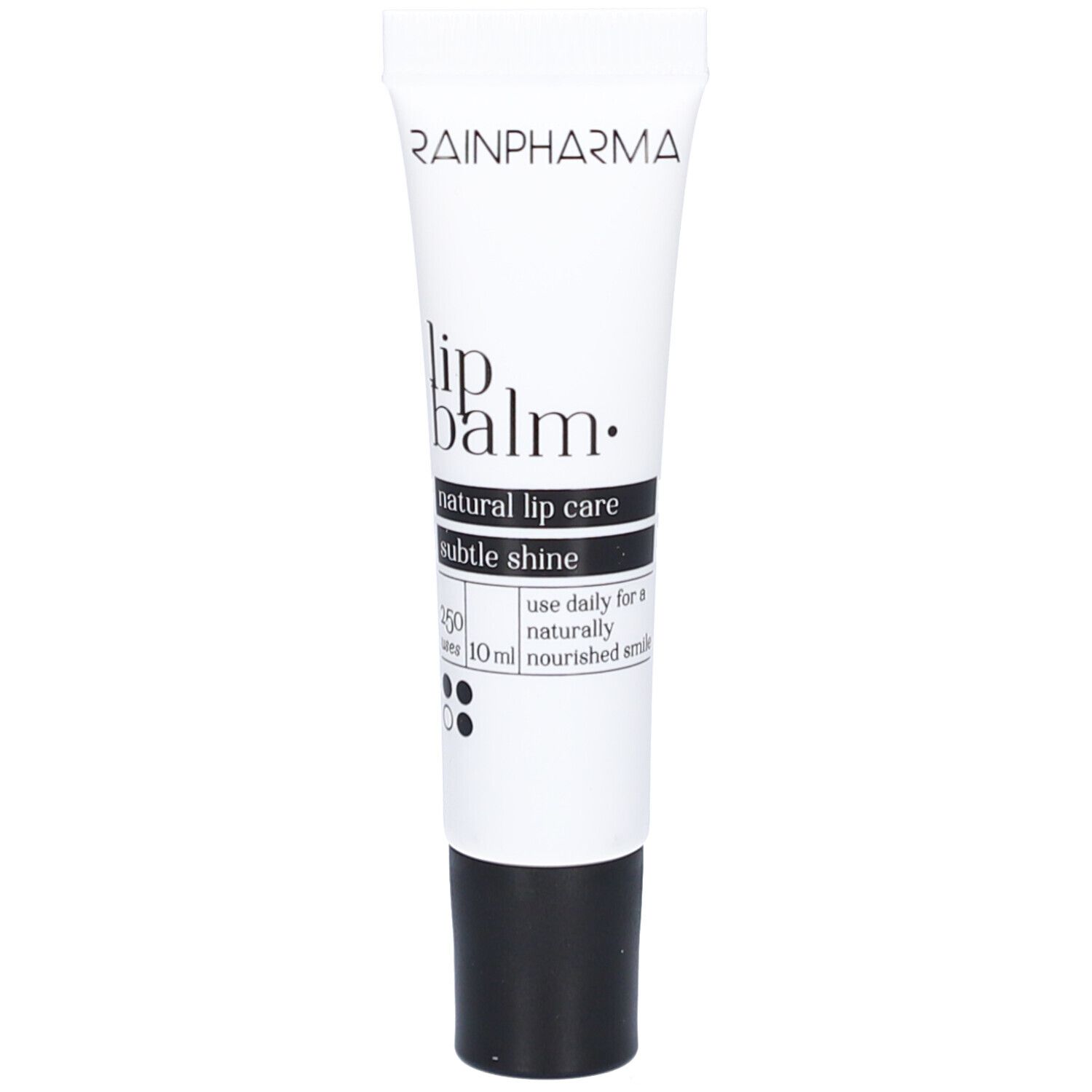 Tube blanche à bouchon noir. Inscription: RAINPHARMA, Lip balm, natural lip care, subtle shine. Volume: 10 ml.
