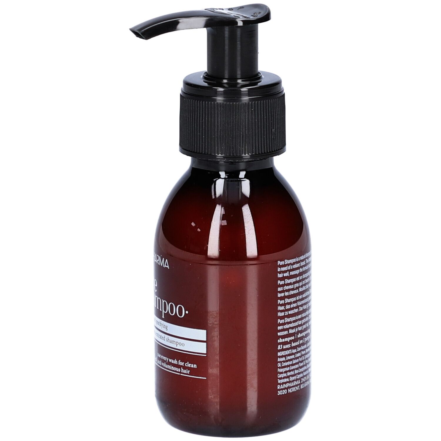 Flacon brun avec pompe noire. Inscription: Pure Shampoo. Texte multilingue. Étiquette avec informations produit.