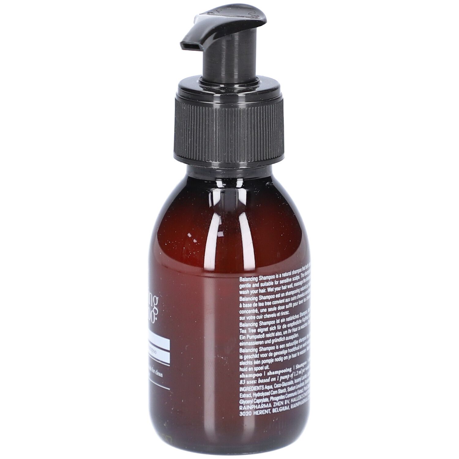 Flacon brun avec pompe noire. Texte sur le côté. Nom du produit: Rainpharma balancing shampoo.