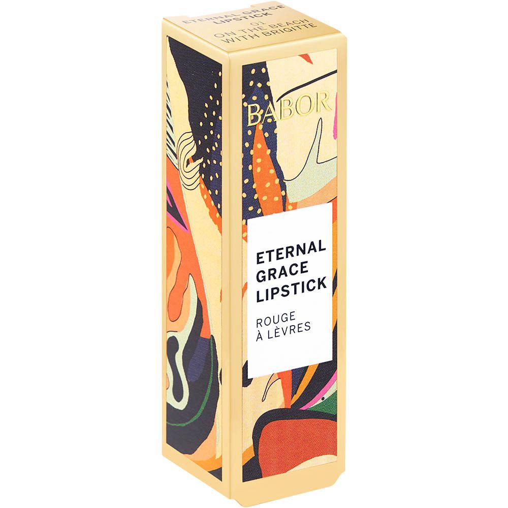 Emballage doré avec rouge à lèvres et motif de feuilles colorées. Texte: Eternal Grace Lipstick, BABOR.
