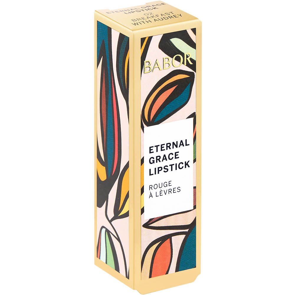 Rouge à lèvres BABOR et emballage. Emballage doré avec nom du produit. Rouge à lèvres avec motif.