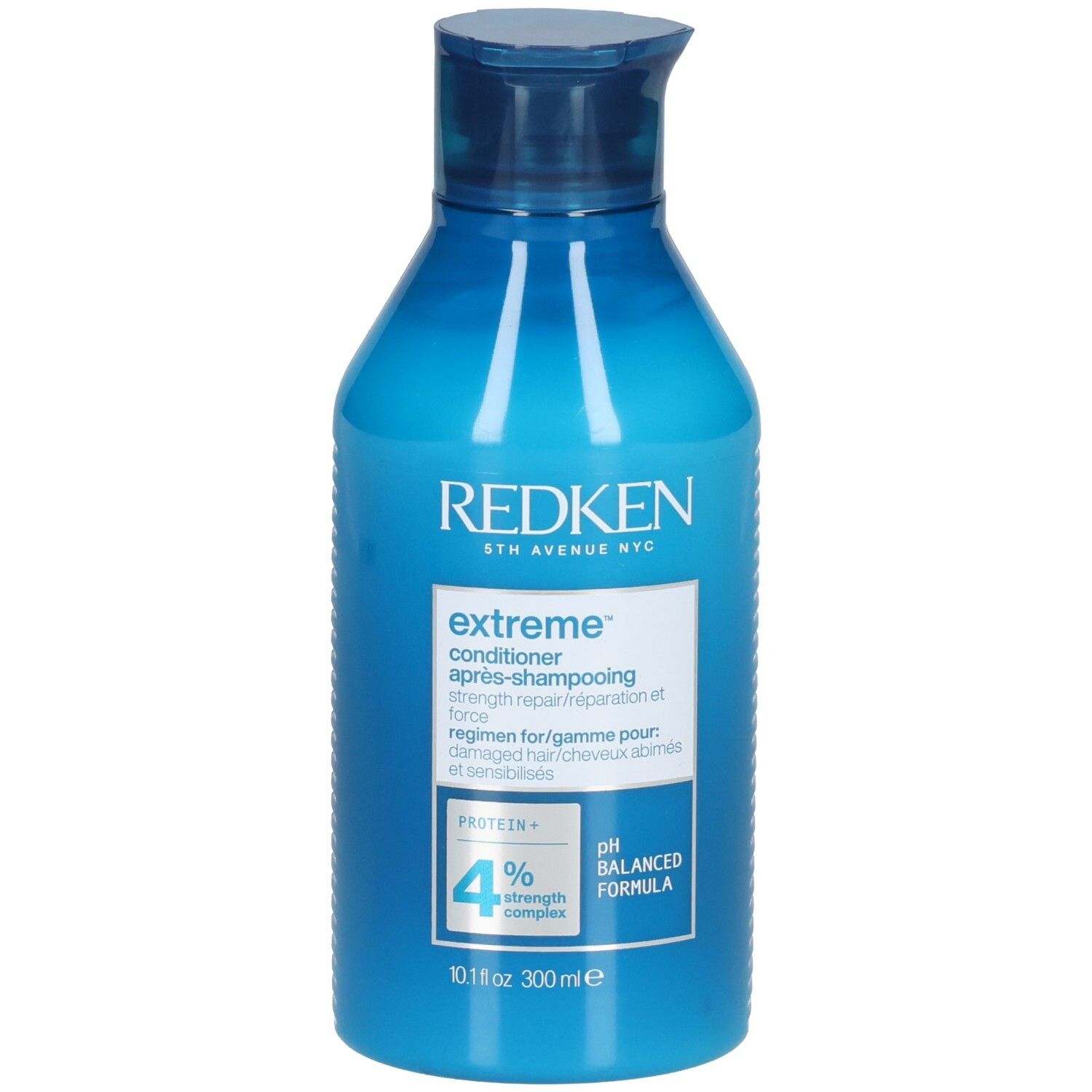 Flacon bleu-turquoise avec bouchon bleu. Inscription: Redken Extreme Conditioner. Contient 4% Strength Complex. 300ml.